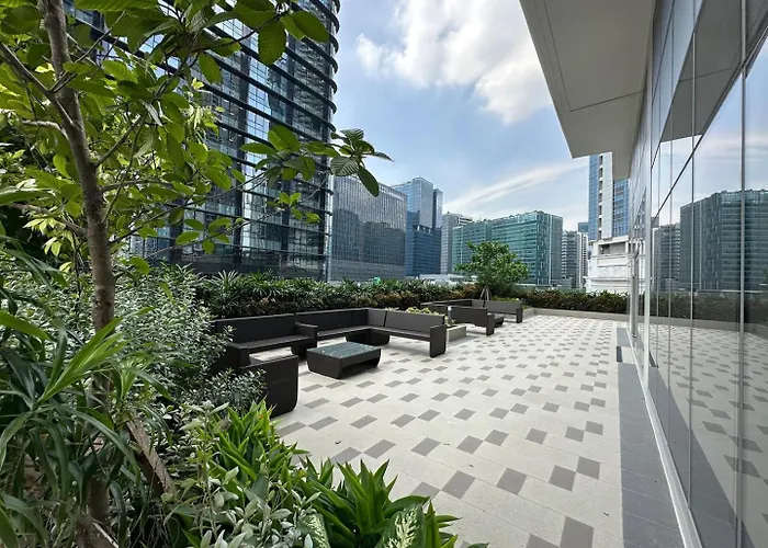 Apartment Cozy Sunlit Lounge W/ Balcony View Uptown Bgc Manila